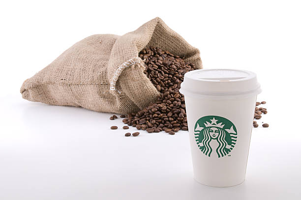 starbucks coffee cup - starbucks coffee bean editorial stock-fotos und bilder