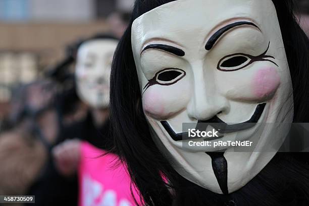 Anónimo Protesters - Fotografias de stock e mais imagens de Máscara - Disfarce - Máscara - Disfarce, Pessoa Irreconhecível, Crime Informático