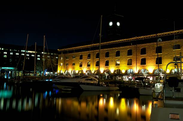Saint Katherine Docks by night, London, UK stock photo