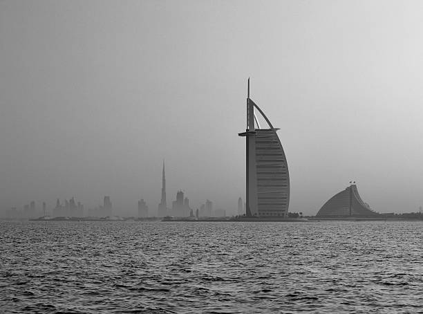 Burj Al Arab in Dubai seen at sunset in United Arab Emirates.