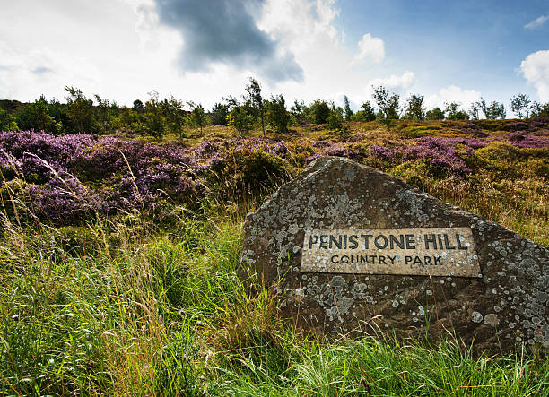 Penistone crags "Penistone Country Park, Haworth, England - August 17, 2011: Penistone Hill country park sign.  This is a country park in Haworth North Yorkshire and is the setting for Wuthering Heights." book title stock pictures, royalty-free photos & images