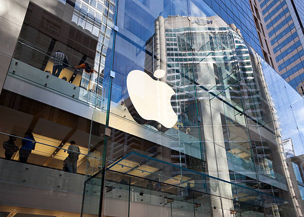 The Apple Computers Store in Sydney Australia "Sydney, Australia - November 4, 2011: Apple Computers logo and shoppers at the Apple Store in Sydney, Australia." apple computer stock pictures, royalty-free photos & images