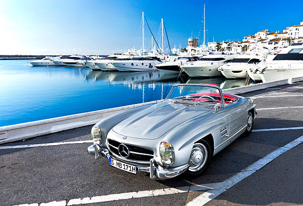 Mercedes 300 SL Roadster "Marbella, Spain - March, 22nd, 2012: Original Mercedes 300 SL Roadster from 1957. parked in marina Puerto Banus in Marbella, Spain. Mercedes is celebrating 60 years of SL this year, since the model was first introduced as a race car in 1952." mercedes benz photos stock pictures, royalty-free photos & images