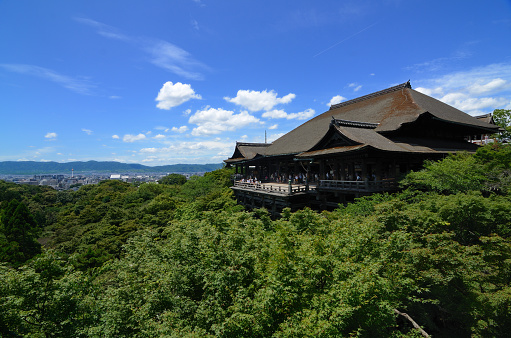Kyoto, Japan - July 10, 2011: The Main building and its stage at Kiyomizu-dera Temple. The temple dates from 778 and the present buildings were constructed in 1633.