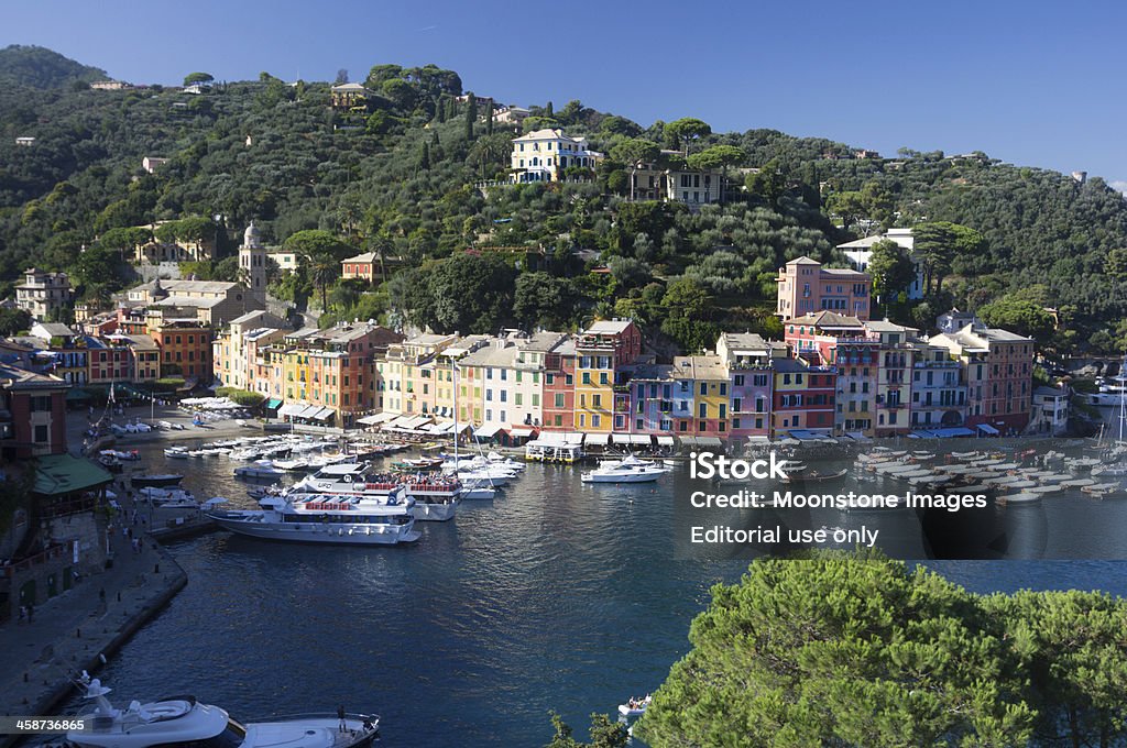 Portofino on the Riviera di Levante, Italy "Portofino, Italy - September 6, 2013: Water taxis and yachts moored at the harbour of Portofino on the Italian Riviera. Many tourists are visible on the water taxis." Aerial View Stock Photo