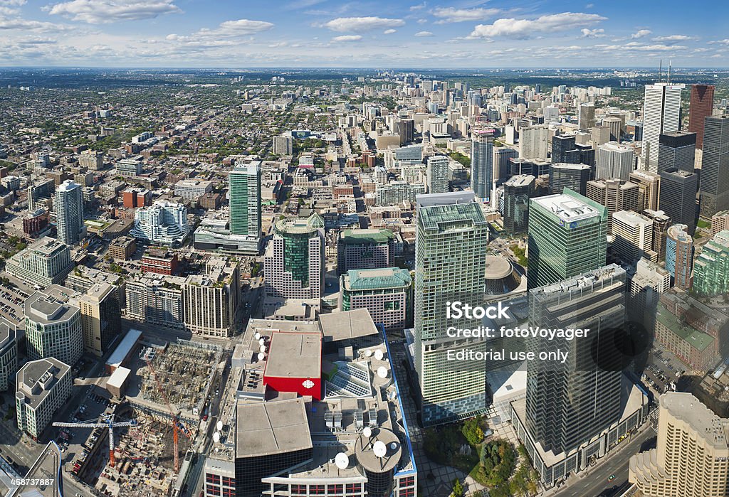 Toronto aerial view over downtown skyscrapers Canada "Toronto, Canada - September 14th, 2011: Aerial view over the crowded city blocks, streets and skyscrapers of downtown. Composite panoramic image created from six contemporaneous sequential photographs." Aerial View Stock Photo