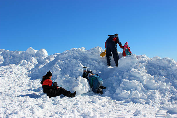 Family playing with snow at Andes mountains - 1 stock photo