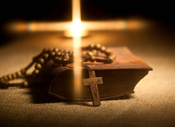 istock Holy Bible and Rosary Beads 458799391