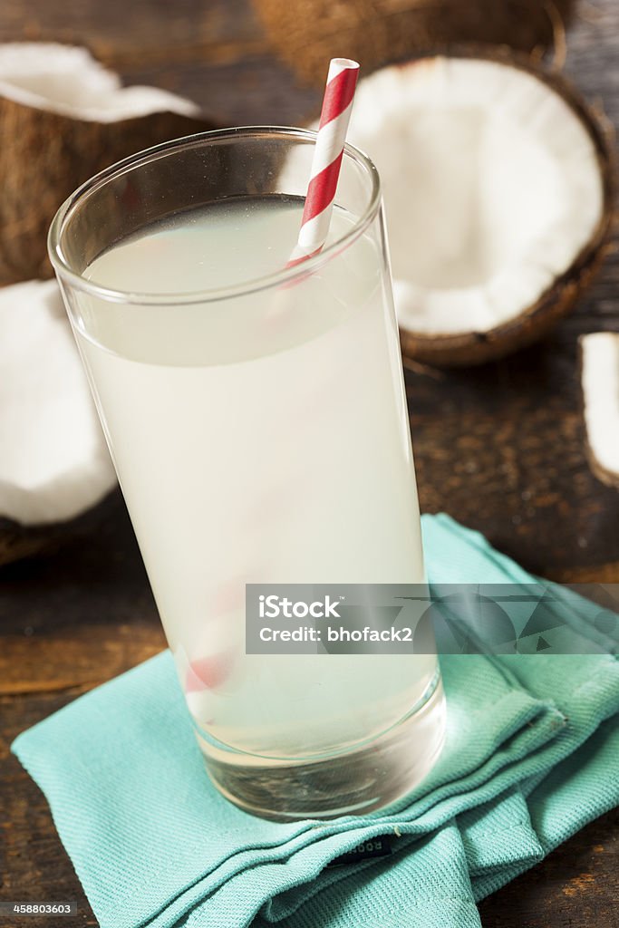 Fresh Organic Coconut Water Fresh Organic Coconut Water in a Glass Alcohol - Drink Stock Photo