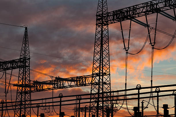 istock Electric Pylons Against Beautiful Sky 458805265