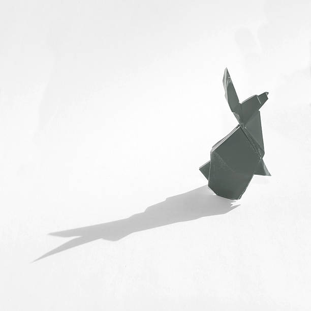 istock Gray Oragami rabbit isolated on white 458810481