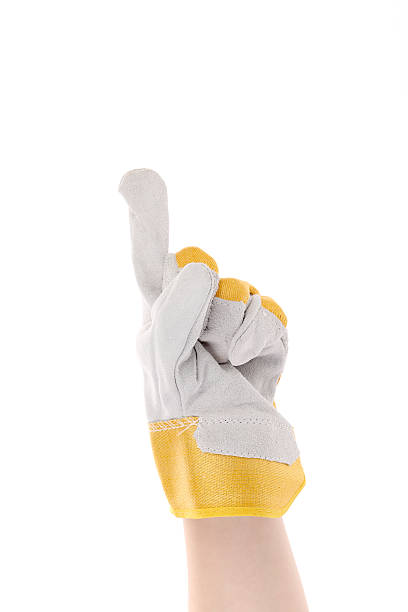 istock Hand in gloves shows one. 458811875