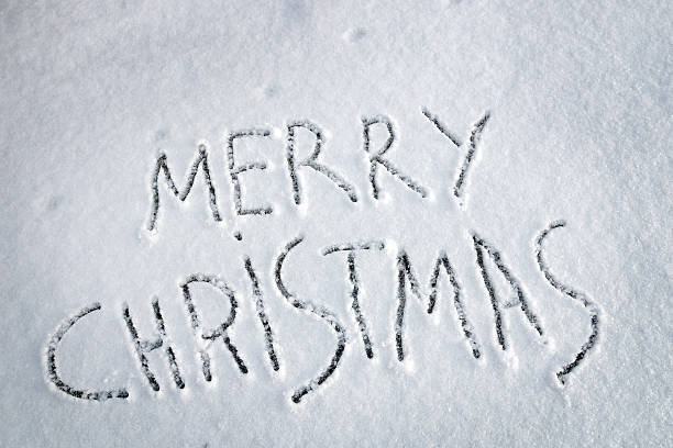 istock Inscription Merry Christmas written on the snow 458812355