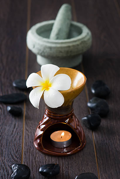istock frangipani spa and aroma  therapy treatment with hot rocks 458812429