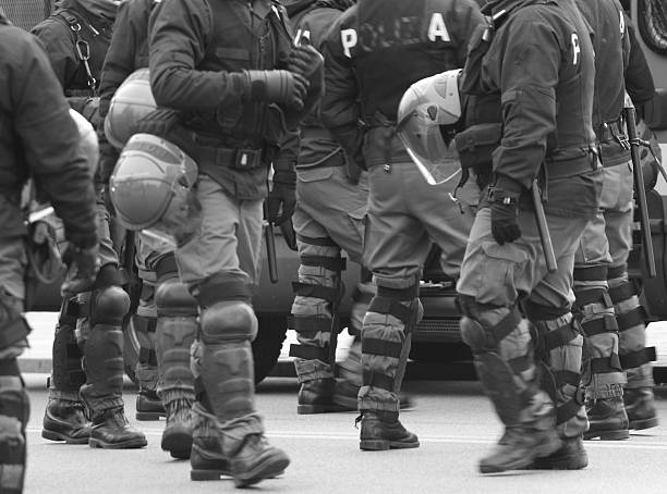 istock policemen in war planning during a control of supporters 458840659