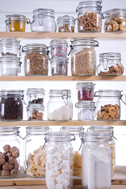istock A pantry filled with glass jars of various ingredients 458851919