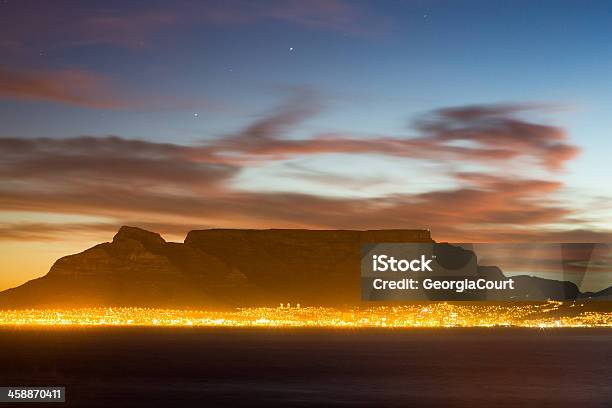 Table Mountain Lit Up By The City Lights Stock Photo - Download Image Now - Africa, South, Western Cape Province