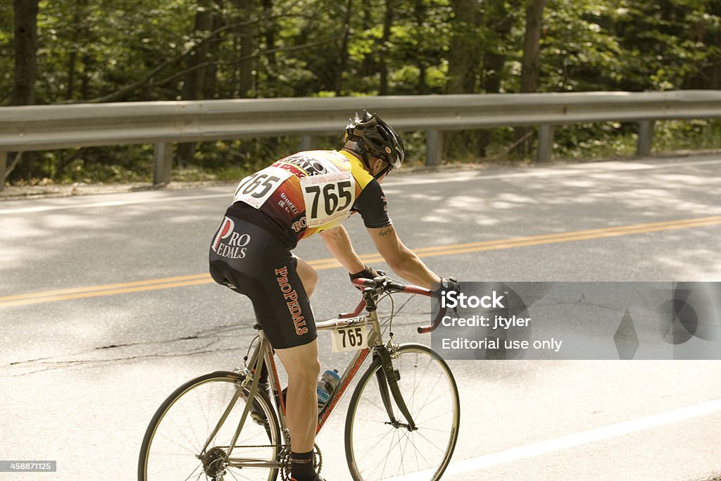 Ciclista em um Pro-Am Corrida de estrada - Foto de stock de Adulto royalty-free