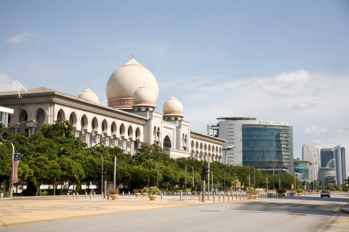 Kuala Lumpur, Malaysia - May 08, 2013: empty main street with administrative buildings in Putrajaya Malaysia