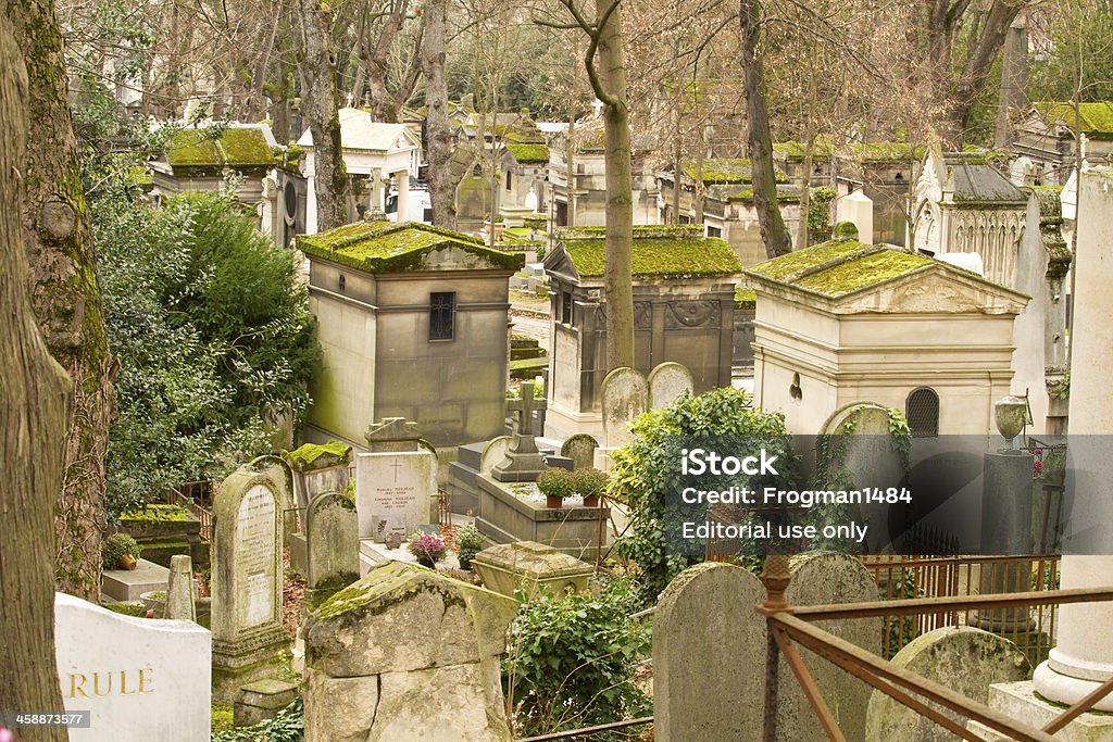 Pere- Lachaise Necropolis Paris, France - January 7, 2013: Pere- Lachaise Necropolis.The graves in the Pere-Lachaise cemetery in Paris France. this cemetery has many famouse French and international people burried here. Like Jim Morrison of the Doors and Frederick Chopin. Cemetery Stock Photo