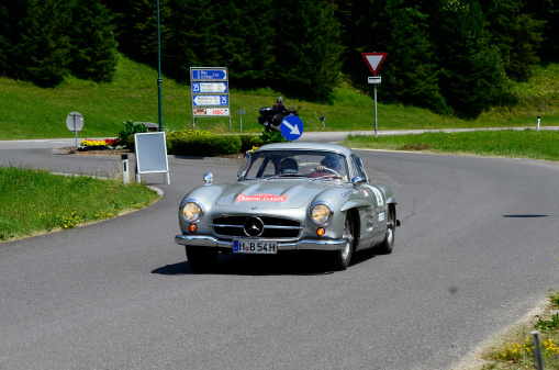 Lunz am See, Austria - July 19th 2013: Mercedes 300 SL on special stage by International Ennstal Classic 2013, a yearly tournament through Austria for vintage cars