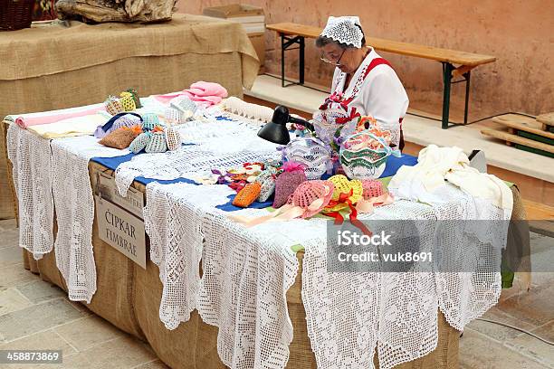 Old Woman Selling Handmade Products From Rab Lace Stock Photo - Download Image Now - Doily, Rab Island, Interior Decor