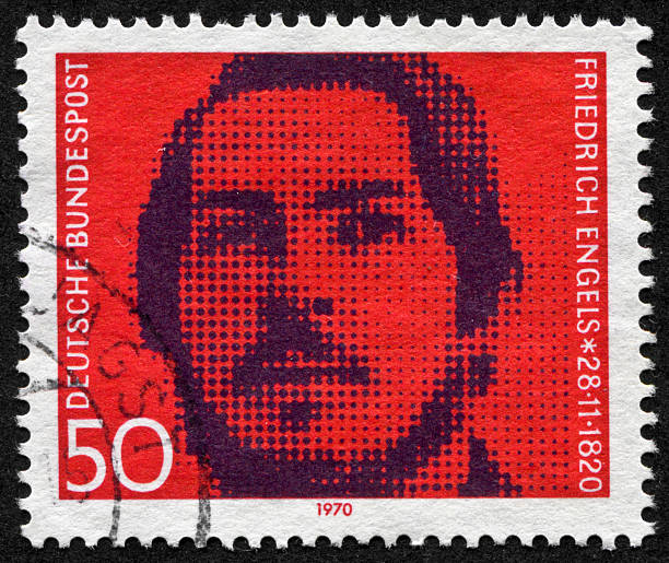 Friedrich Engels Stamp Richmond, Virginia, USA - July 12th, 2013:  Cancelled Stamp From Germany Featuring The German Communist Economist, Friedrich Engels. friedrich engels stock pictures, royalty-free photos & images