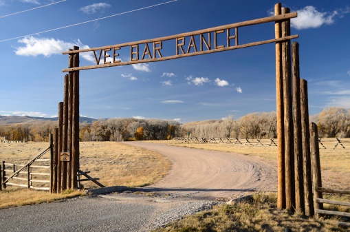 Laramie, Wyoming, USA - October 14, 2012: The Vee Bar Guest Ranch in the high plains desert outside of Laramie, Wyoming. Founded in 1884, Vee Bar is a guest ranch, also known as a dude ranch where people can stay and watch an operational ranch as well as enjoy outdoors activities.