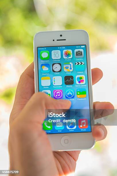 Using Iphone Stock Photo - Download Image Now - Apple Computers, Big Tech, Editorial