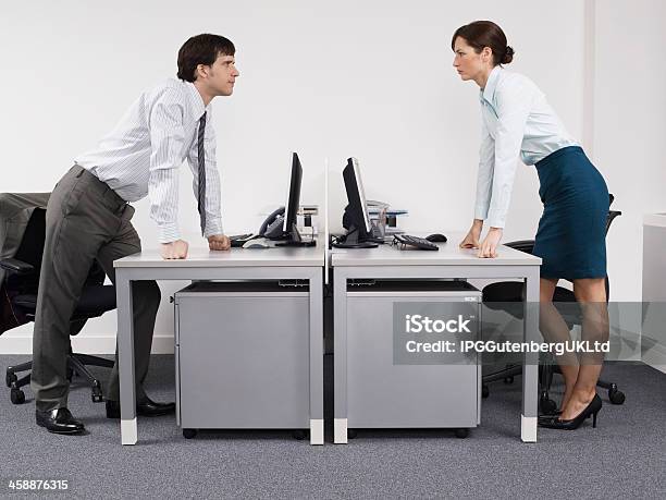 Rival Business Colleagues In Office Stock Photo - Download Image Now - Adult, Business, Business Person
