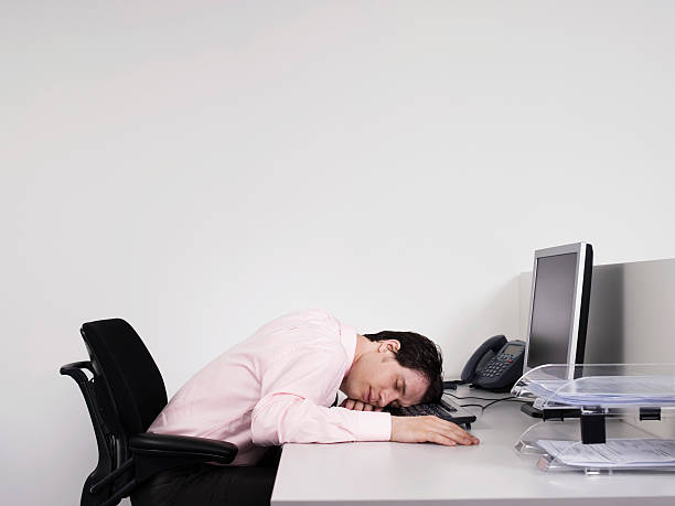 istock Male Office Worker Asleep At Desk 458876413