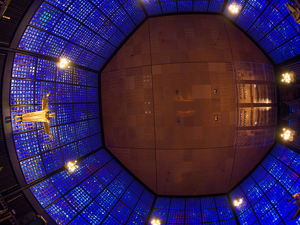 Berlin, Germany - June 29, 2013: Image taken with a fisheye lens from floor to ceiling within the Kaiser Wilhelm Memorial Church, Berlin, Germany. The church was designed by  Egon Eiermann and from the way the photograph has been taken it allows you to appreciate the unusual octagonal shape of the building.