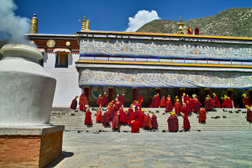 Xiahe,China - July 28, 2010:The Lama in Labrang Monastery comes together preparing to go into the main hall and pray for people who ask for it.