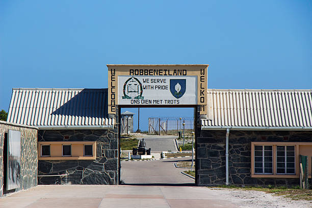 Robben Island Welcome Sign Cape Town, South Africa - May 2, 2013: The Entrance to Robben Island from the Harbour apartheid sign stock pictures, royalty-free photos & images