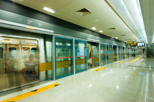 Seoul, Korea - September 8, 2009: A beautifully clean platform of the Seoul metro subway system, the worlds most extensive by length, in Seoul, South Korea on September 8, 2009