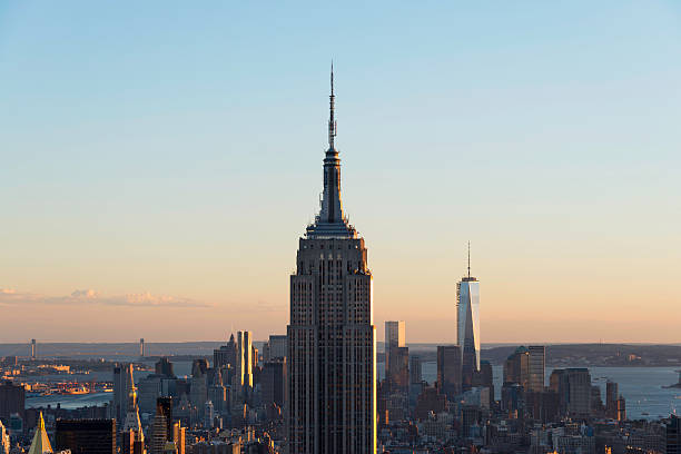istock Empire State and New York skyline at dusk 458879711