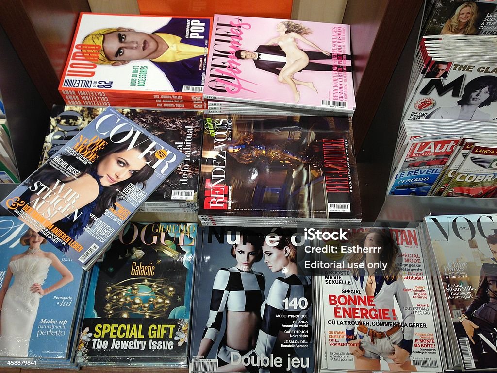 Popular french magazines Cologne,Germany- February 23,2013: Popular french magazines  in french language displayed inside a newsstand on the central station(Cologne,Germany) Magazine - Publication Stock Photo