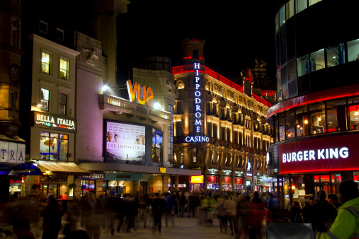 London, UK - January 1, 2013: Movie theatre, casino and restaurants in Leicester Square in London, UK on January 1, 2013