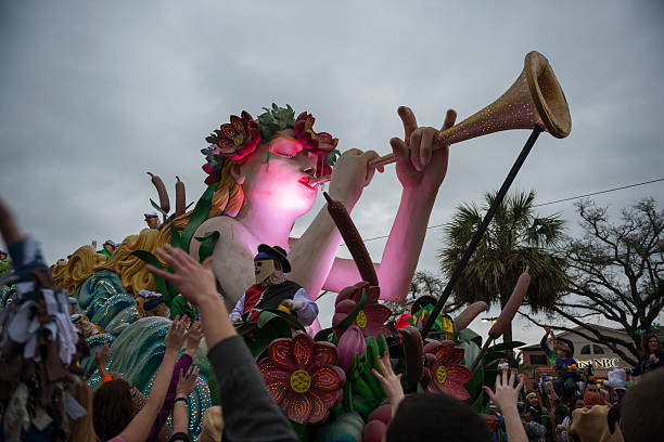 Mardi Gras parade - Krewe of Endymion New Orleans, Louisiana, USA - February 9, 2013: An ornately decorated float belonging to the Krewe of Endymion passes through a crowd on Canal Street during Mardi Gras. new orleans mardi gras stock pictures, royalty-free photos & images