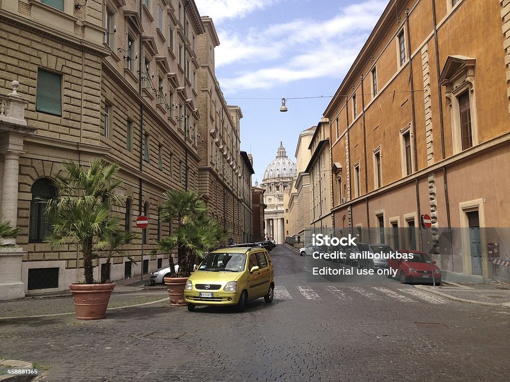 Tourists at Saint Peter's Square in Vatican Vatican, Vatican City State - July 29, 2013: Tourists at Saint Peter's Square in Vatican. Photo taken from Vatican City State. Photo taken with Apple iPhone. 2013 Stock Photo