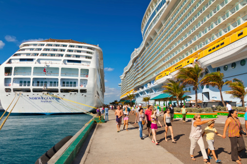 Nassau, Bahamas - Jan. 13, 2013:  Cruise ship passengers disembark from ship in Nassau, the capital city of the Bahamas.  Tourism accounts for nearly sixty percent of the islands income.