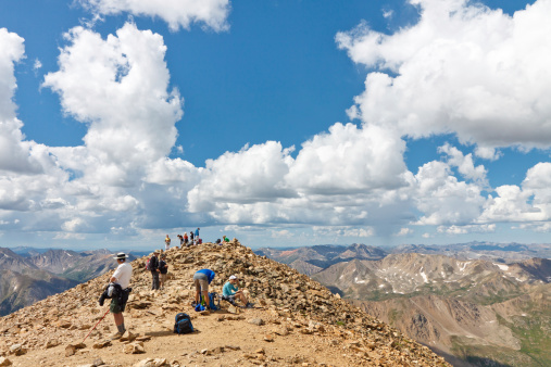 Mount Elbert, Colorado, USA - August 24, 2011: Hikers enjoy the view from Mount Elbert, Colorado's highest peak . Climbing all of Colorado's fourteeners is a popular pastime among peak baggers.