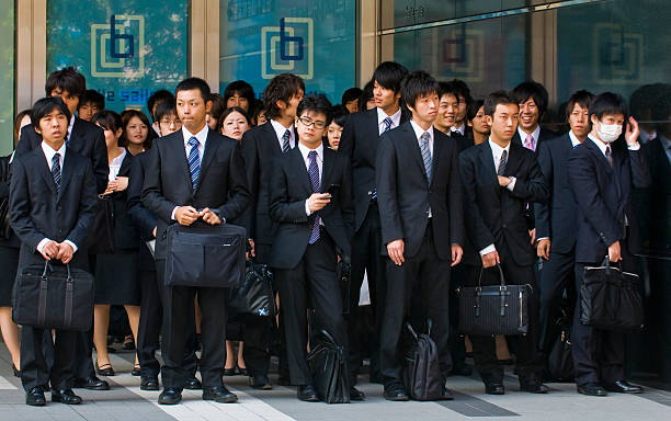 Japonês trabalhadores de Escritório - fotografia de stock