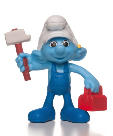 Miami, USA - August 06, 2013: Handy Smurf McDonalds happy meal toy. This is a plastic toy sold as part of the McDonald's Happy Meals.