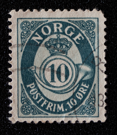 Bandung, West Java, Indonesia, July 16, 2010: A stamp printed in Norway shows image of crown and horn.
