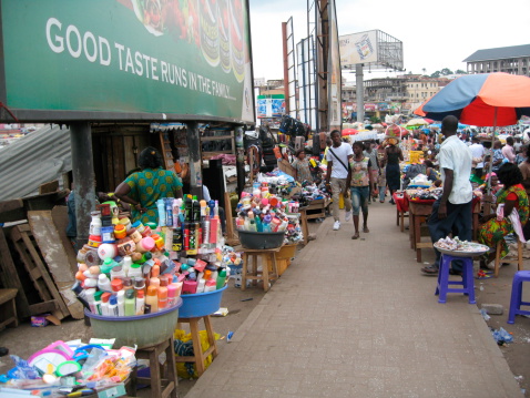 Kumasi, Ghana - August 21st, 2012: The centre of Kumasi is the main market place in West Africa. People, traders and customers meet each other at this crowded place.