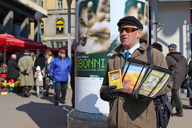 Zagreb, Croatia - March 6, 2010: Jehovah witness selling religious literature on Ban Jelacic square on March 06, 2010 in Zagreb, Croatia. The religion has worldwide membership of over 7 million