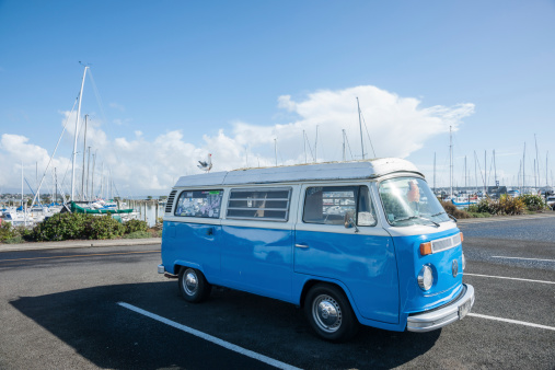 Tauranga, New Zealand - August 17, 2013:blue and white retro Volkswagen Kombi van parked at the Tauranga Marina