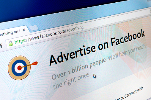 Izmir, Turkey - August 17, 2013: Close up of Facebook Advertising page on the web browser. Facebook makes most of its money through ads.