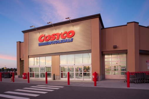 Drummondville,Quebec,Canada-July 12,2013:Costco Wholesale storefront in Drummondville at dusk.Costco Wholesale operates an international chain of membership warehouses, carrying brand name merchandise at substantially lower prices.